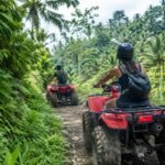 Traveler riding an ATV on a Bali jungle track